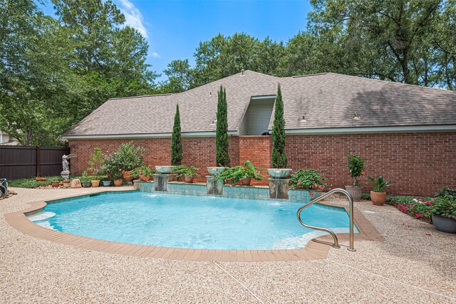 26 Skyland Pl, The Woodlands, TX 77381 - view of pool featuring a fenced backyard and a patio area