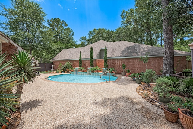 26 Skyland Pl, The Woodlands, TX 77381 - view of pool featuring a patio area and a fenced backyard
