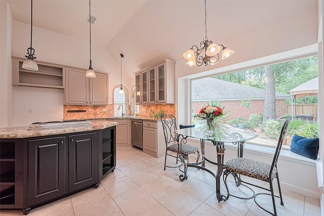 26 Skyland Pl, The Woodlands, TX 77381 - kitchen with open shelves, stainless steel appliances, decorative backsplash, light tile patterned flooring, and high vaulted ceiling