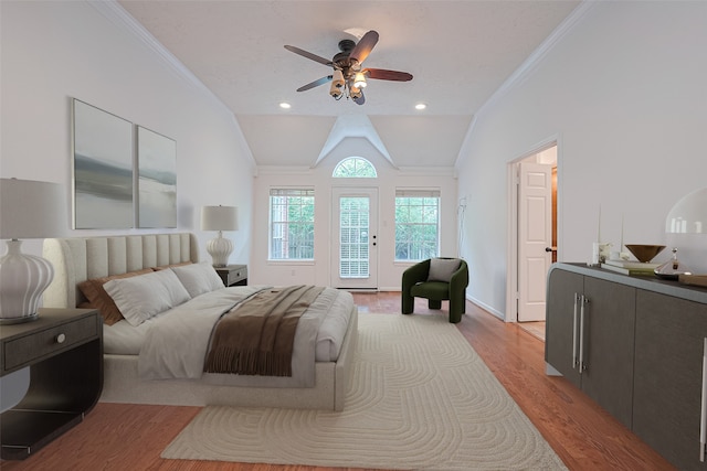 26 Skyland Pl, The Woodlands, TX 77381 - bedroom featuring access to outside, crown molding, light wood finished floors, vaulted ceiling, and ceiling fan