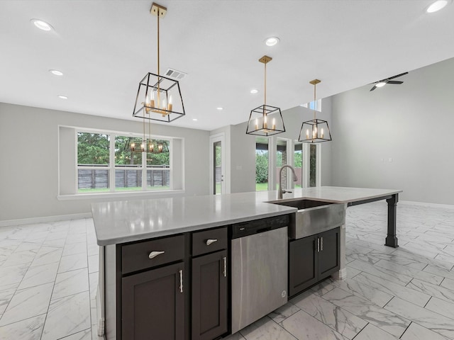 2107 Jitterbug Ln, Katy, TX 77493 - kitchen featuring dishwasher, light marble finish flooring, a sink, a chandelier, and light countertops