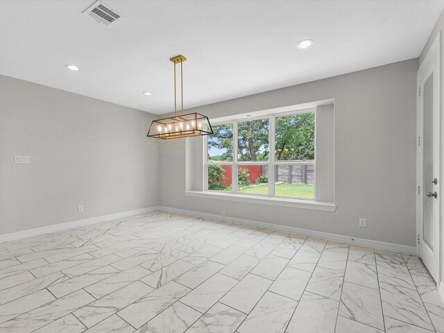 2107 Jitterbug Ln, Katy, TX 77493 - empty room with light marble finish floors, recessed lighting, a chandelier, and baseboards