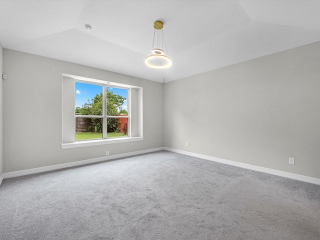 2107 Jitterbug Ln, Katy, TX 77493 - carpeted empty room with baseboards, a smoke detector, and lofted ceiling