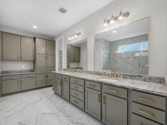 2107 Jitterbug Ln, Katy, TX 77493 - bathroom with a marble finish shower, marble finish floors, double vanity, and recessed lighting