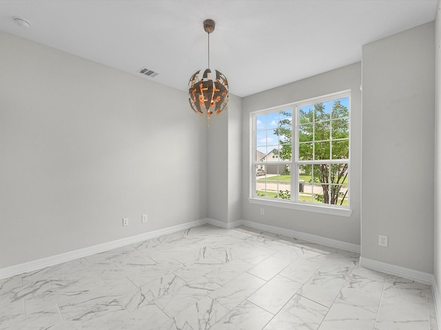 2107 Jitterbug Ln, Katy, TX 77493 - empty room featuring light marble finish floors, baseboards, and a smoke detector
