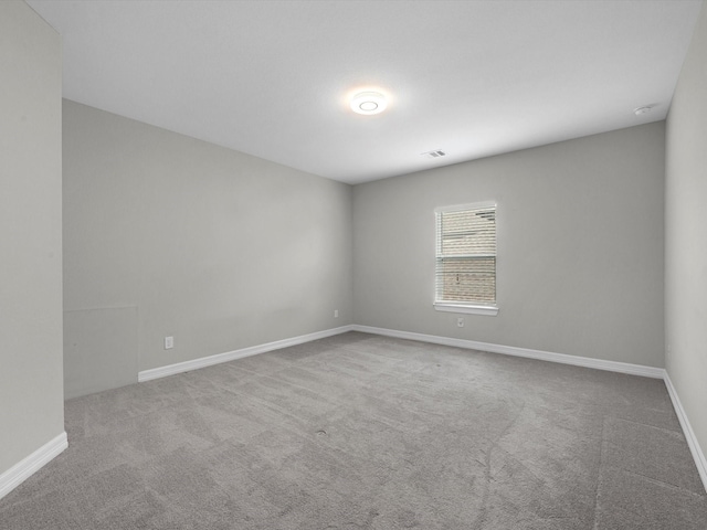 2107 Jitterbug Ln, Katy, TX 77493 - spare room featuring carpet and baseboards