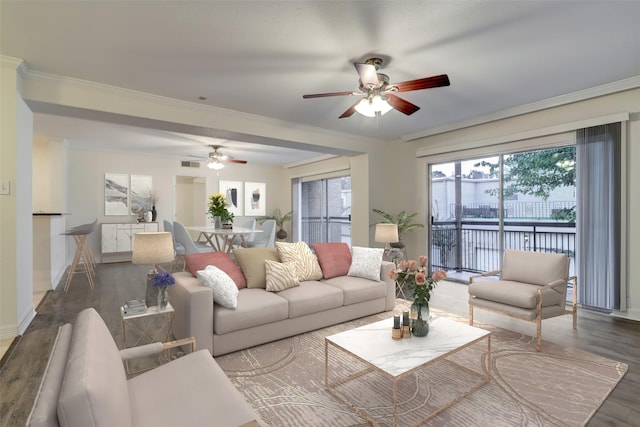 4515 Briar Hollow Pl Unit 213, Houston, TX 77027 - living area featuring ceiling fan, wood finished floors, ornamental molding, a water view, and baseboards