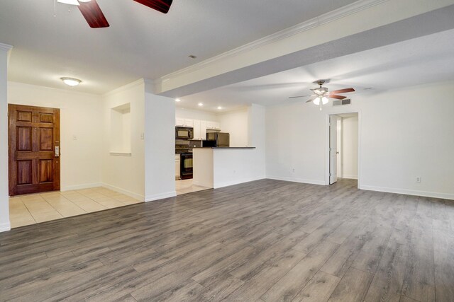 4515 Briar Hollow Pl Unit 213, Houston, TX 77027 - unfurnished living room with a ceiling fan, light wood-style floors, ornamental molding, baseboards, and recessed lighting