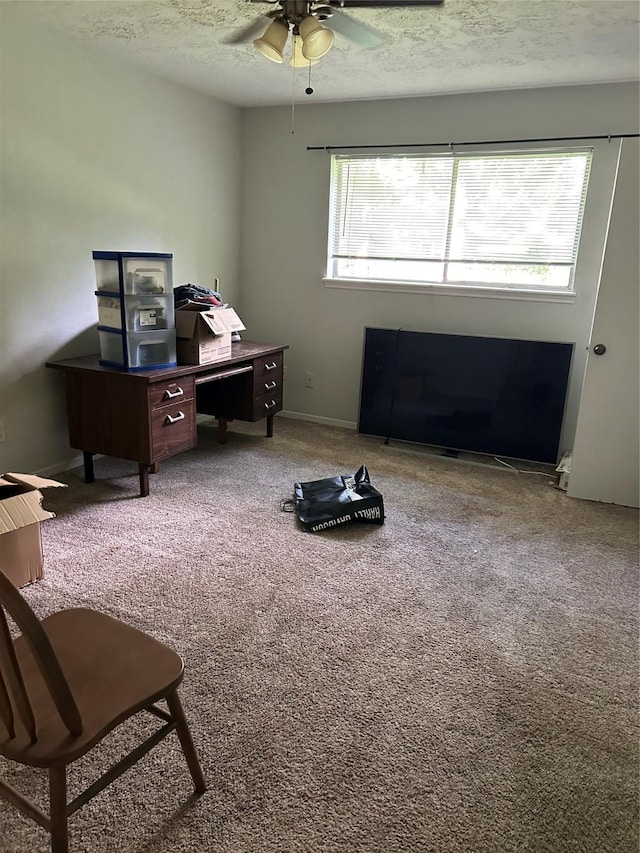 7 Ollerton Dr, Conroe, TX 77303 - office space with ceiling fan, a textured ceiling, carpet floors, and baseboards