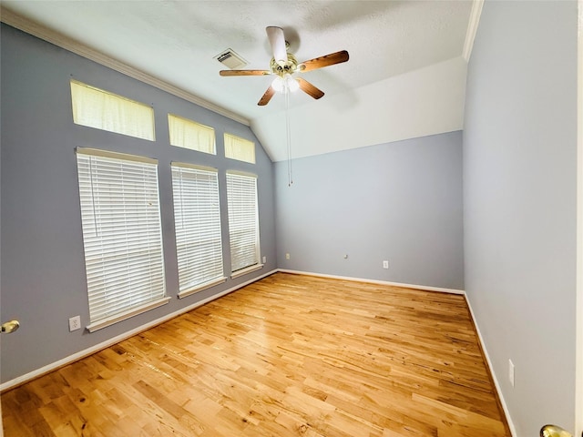 210 Cedar Lake Dr, League City, TX 77573 - empty room featuring a ceiling fan, lofted ceiling, wood finished floors, and crown molding