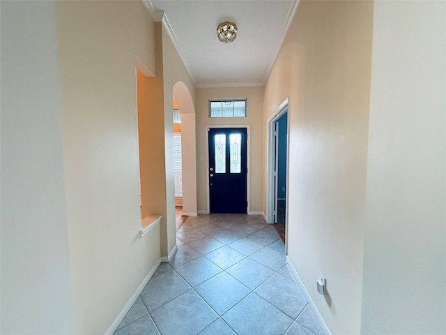 210 Cedar Lake Dr, League City, TX 77573 - doorway to outside with arched walkways, ornamental molding, and light tile patterned floors