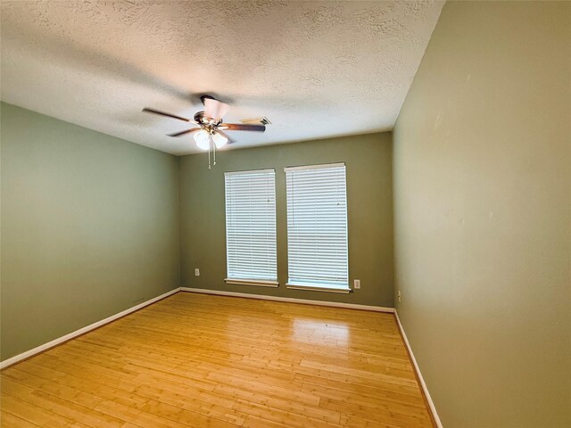 210 Cedar Lake Dr, League City, TX 77573 - empty room featuring ceiling fan, light wood-style flooring, and a textured ceiling