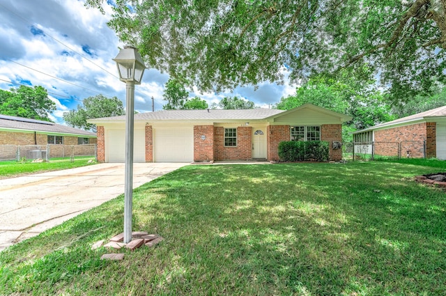 637 Circle Way, Alvin, TX 77511 - ranch-style home with driveway, a garage, and brick siding