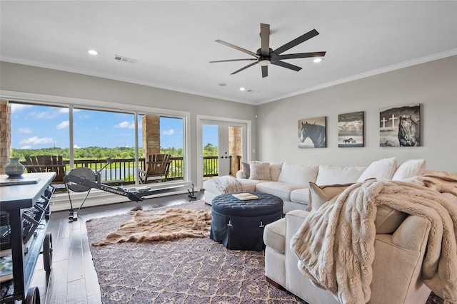 2112 Washington Ave, Alvin, TX 77511 - living room featuring ceiling fan, wood-type flooring, recessed lighting, and ornamental molding
