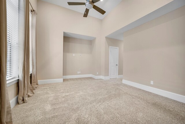 5401 Larkin St, Houston, TX 77007 - unfurnished room featuring ceiling fan, light carpet, and baseboards