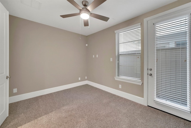 5401 Larkin St, Houston, TX 77007 - unfurnished room featuring carpet, baseboards, and a ceiling fan