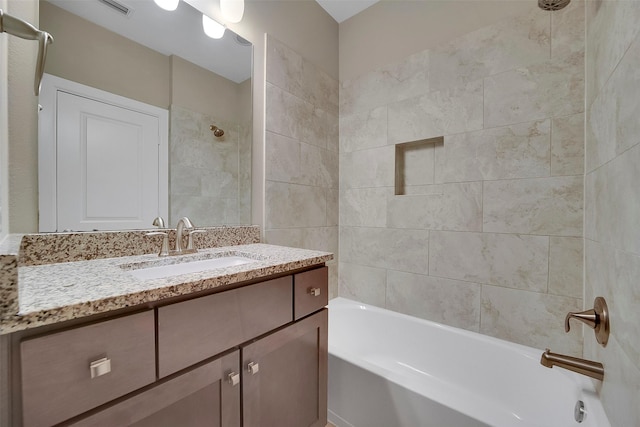 5401 Larkin St, Houston, TX 77007 - full bathroom with vanity and washtub / shower combination
