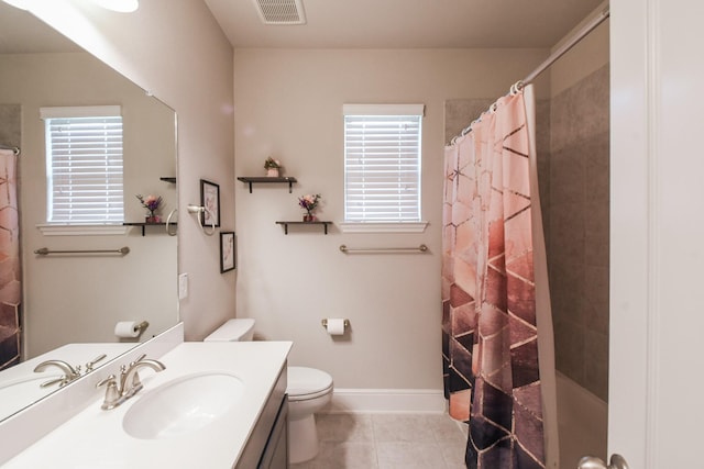 13326 Hartford Bay Trl, Cypress, TX 77429 - full bath with tile patterned flooring, vanity, healthy amount of natural light, and a shower with shower curtain