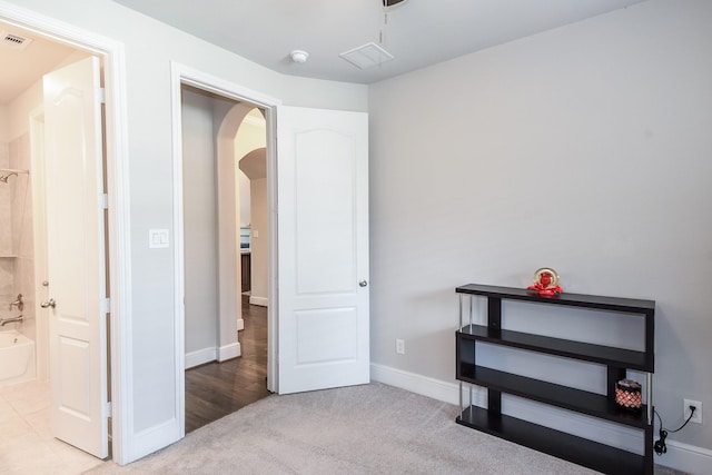 13326 Hartford Bay Trl, Cypress, TX 77429 - bedroom with arched walkways and carpet floors