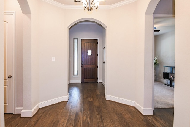 13326 Hartford Bay Trl, Cypress, TX 77429 - foyer entrance featuring dark wood-style flooring, crown molding, and a chandelier