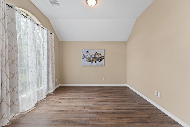 6318 Pleasant Stream Dr, Katy, TX 77449 - spare room featuring lofted ceiling and wood finished floors