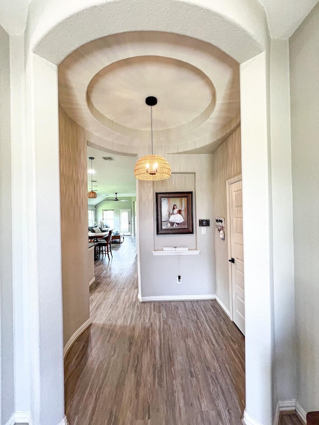 2900 Green Ash Ct, Conroe, TX 77301 - hallway featuring wood finished floors, baseboards, and a raised ceiling