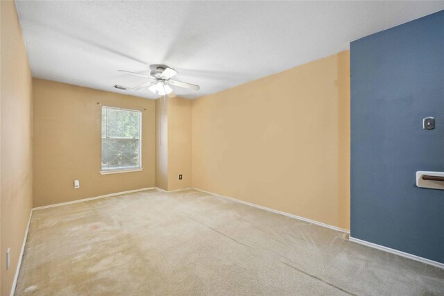8202 Caddo Rd, Houston, TX 77078 - carpeted spare room featuring ceiling fan and baseboards