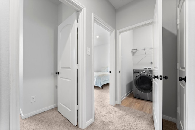 20730 Solstice Point Dr, Hockley, TX 77447 - washroom with washer / dryer, carpet, and baseboards