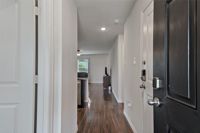 302 Connecticut St, Houston, TX 77029 - hallway with dark wood-style flooring, baseboards, and recessed lighting