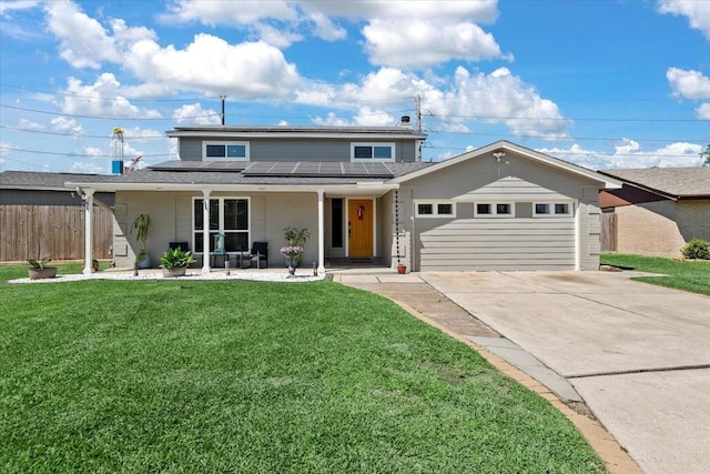 8307 Parasol Ln, Houston, TX 77064 - traditional home featuring covered porch, solar panels, a garage, and driveway