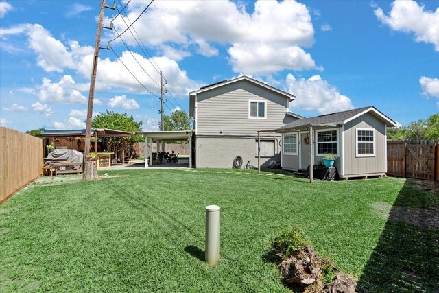 8307 Parasol Ln, Houston, TX 77064 - back of house with a patio area and brick siding