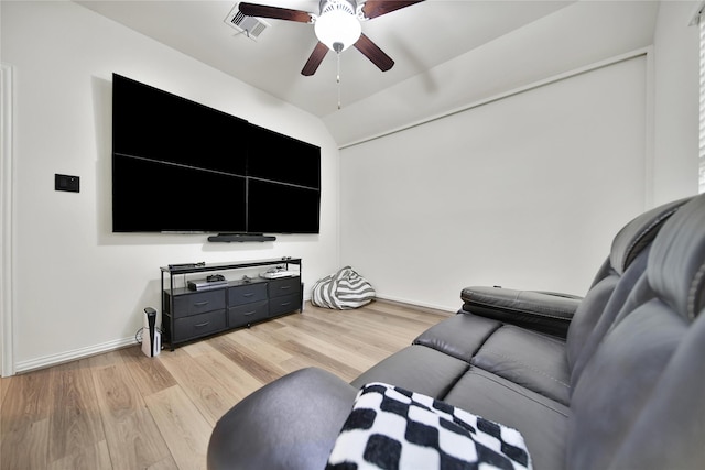 7411 Nottington Ct, Spring, TX 77379 - living area featuring a ceiling fan, light wood-style flooring, and vaulted ceiling