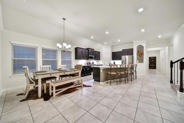 7411 Nottington Ct, Spring, TX 77379 - dining room with a chandelier, crown molding, light tile patterned floors, recessed lighting, and vaulted ceiling