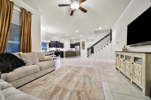 7411 Nottington Ct, Spring, TX 77379 - living room with a ceiling fan, light tile patterned floors, stairway, a chandelier, and ornamental molding