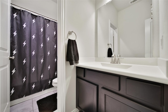 7411 Nottington Ct, Spring, TX 77379 - full bathroom featuring vanity, tile patterned floors, and curtained shower