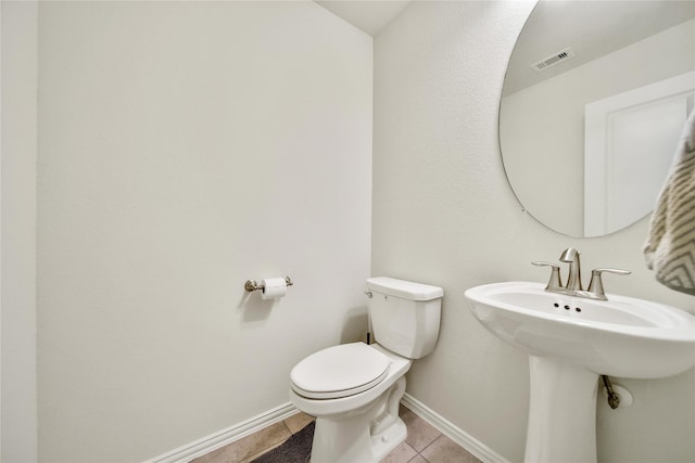 7411 Nottington Ct, Spring, TX 77379 - bathroom featuring toilet and tile patterned floors