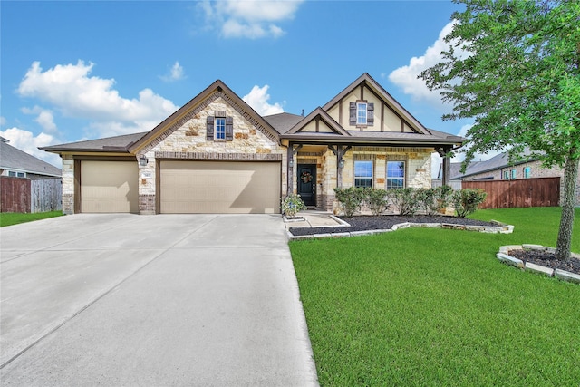 7411 Nottington Ct, Spring, TX 77379 - view of front of house with stone siding, a garage, and concrete driveway