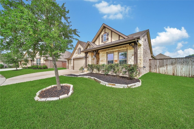 7411 Nottington Ct, Spring, TX 77379 - tudor house with stone siding, driveway, a garage, and stucco siding