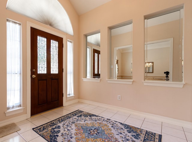 2107 Enchanted Lake Dr, League City, TX 77573 - entryway with light tile patterned floors and healthy amount of natural light