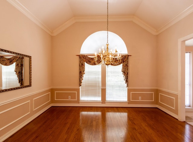 2107 Enchanted Lake Dr, League City, TX 77573 - unfurnished room featuring plenty of natural light, a wainscoted wall, a chandelier, wood finished floors, and vaulted ceiling
