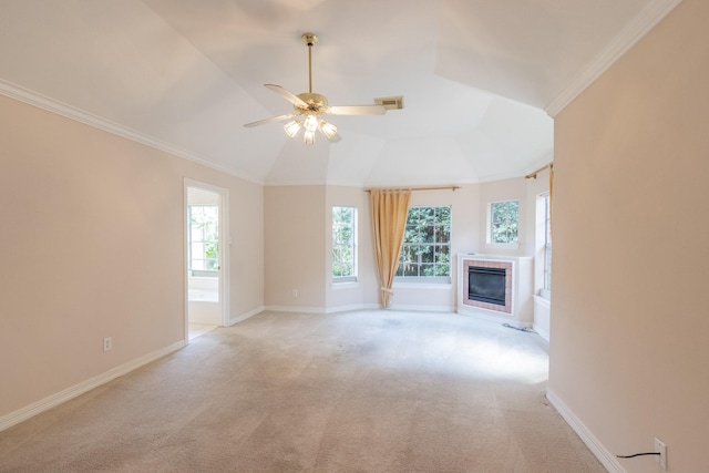 2107 Enchanted Lake Dr, League City, TX 77573 - unfurnished living room with healthy amount of natural light, a ceiling fan, light colored carpet, baseboards, and ornamental molding