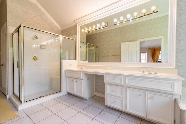 2107 Enchanted Lake Dr, League City, TX 77573 - full bathroom with lofted ceiling, wallpapered walls, double vanity, crown molding, and a stall shower