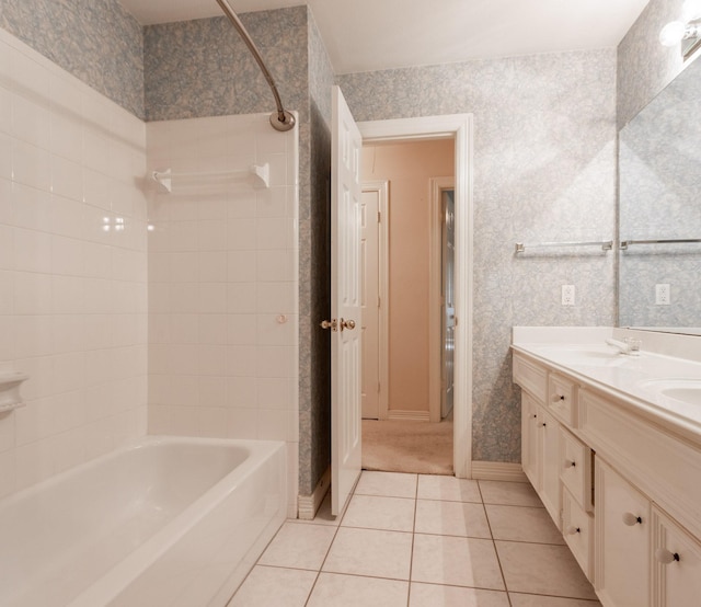 2107 Enchanted Lake Dr, League City, TX 77573 - bathroom with tile patterned floors, double vanity, wallpapered walls, shower / washtub combination, and baseboards