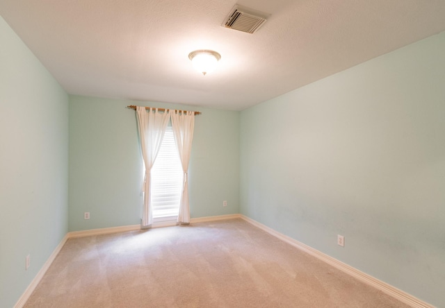 2107 Enchanted Lake Dr, League City, TX 77573 - empty room featuring light carpet and baseboards
