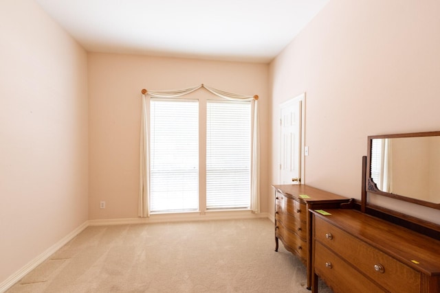 2107 Enchanted Lake Dr, League City, TX 77573 - bedroom featuring light carpet and baseboards