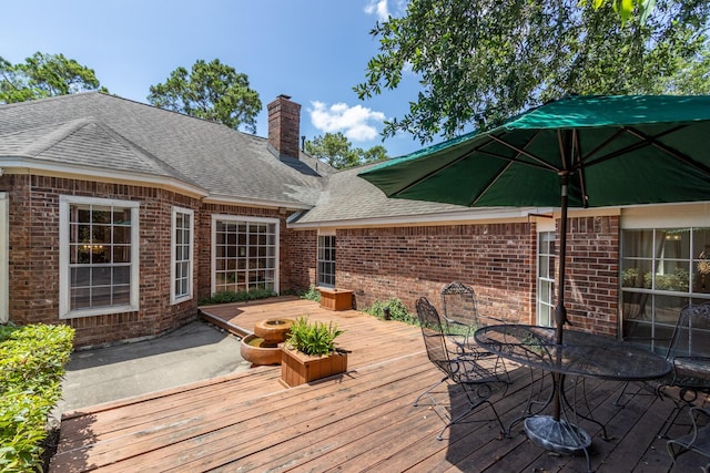 2107 Enchanted Lake Dr, League City, TX 77573 - wooden terrace with outdoor dining area