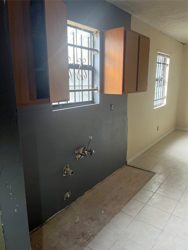 710 Fields St, Richmond, TX 77469 - washroom with a textured ceiling