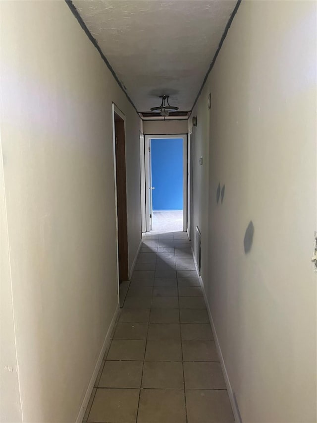 710 Fields St, Richmond, TX 77469 - hall with baseboards and light tile patterned floors