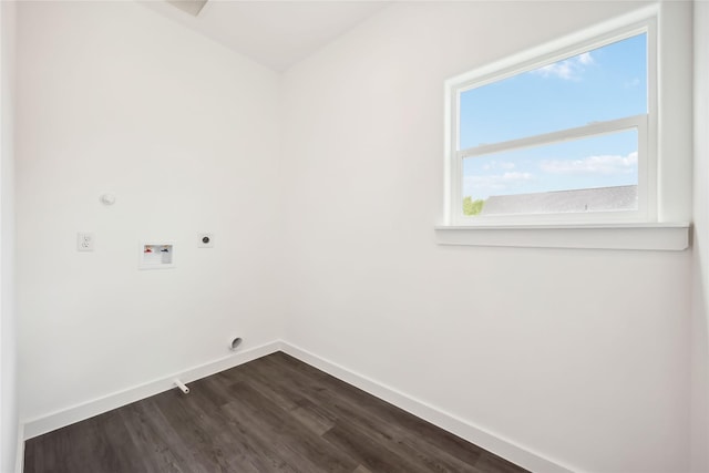 5608 Hollow Pines Dr, Houston, TX 77049 - laundry room with hookup for an electric dryer, hookup for a washing machine, baseboards, and dark wood-style floors