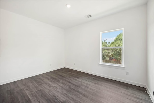 5608 Hollow Pines Dr, Houston, TX 77049 - unfurnished room featuring dark wood-style floors, baseboards, and recessed lighting